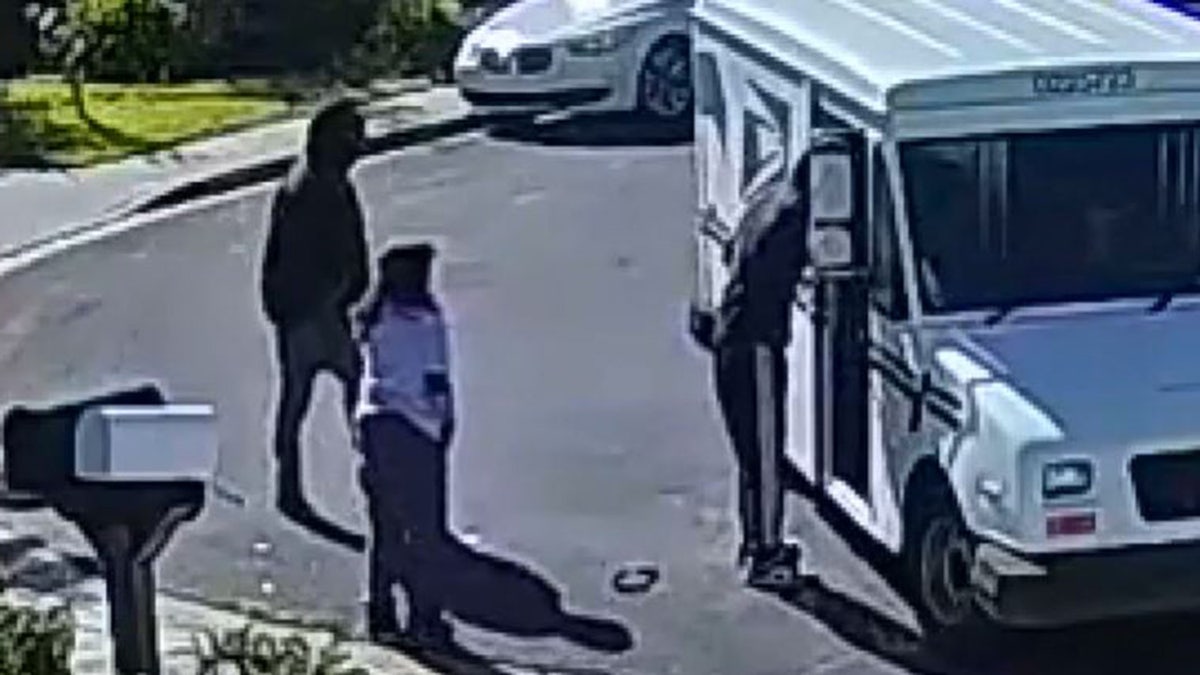 California postal worker robbed at gunpoint in brazen daytime attack caught on video